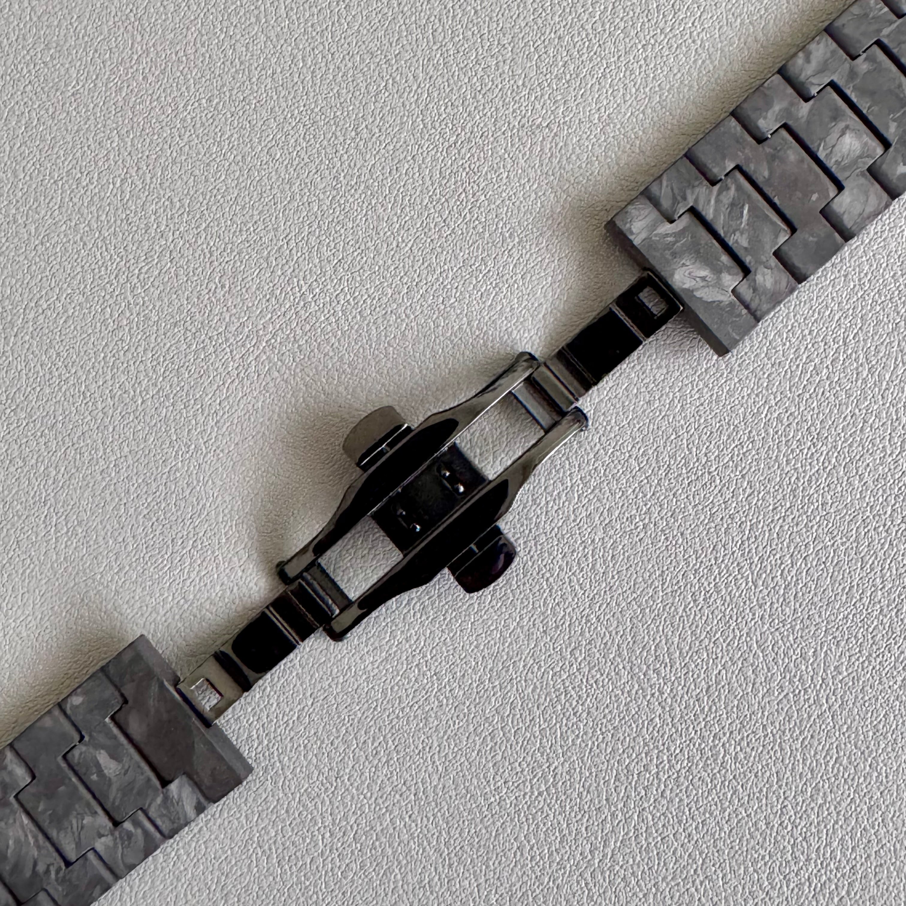 Further close up of PVD black steel butterfly clasp
