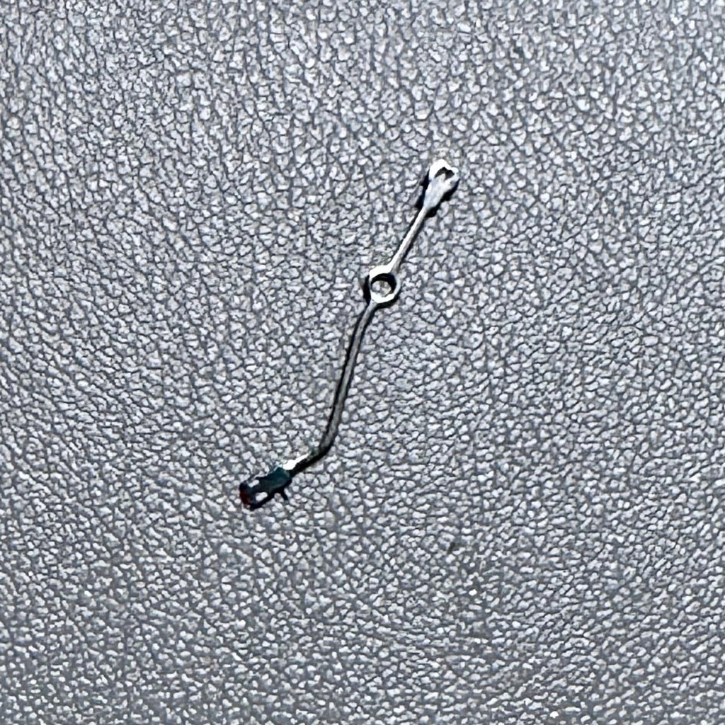 Watch hand for watch modification and assembly on a textured background