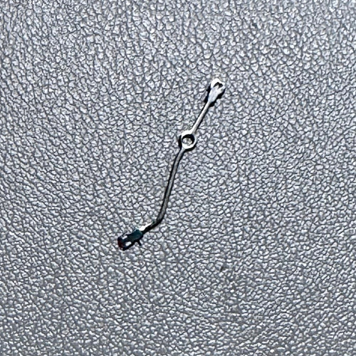 Watch hand for watch modification and assembly on a textured background