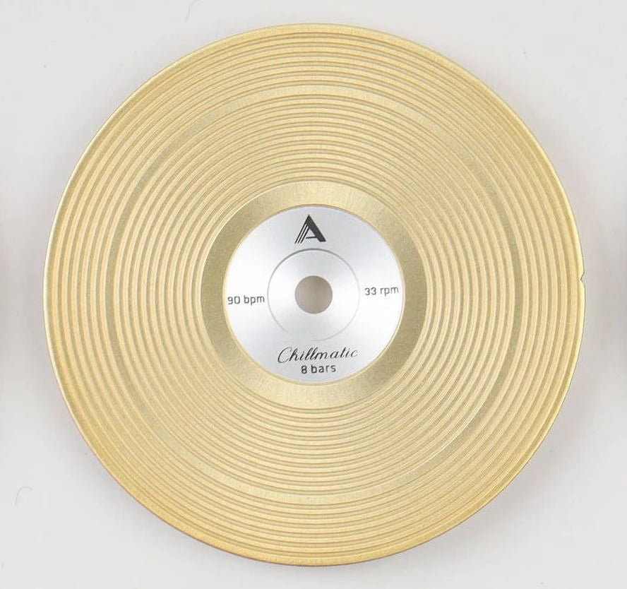1 vinyl record-style watch dial lying flat on a surface