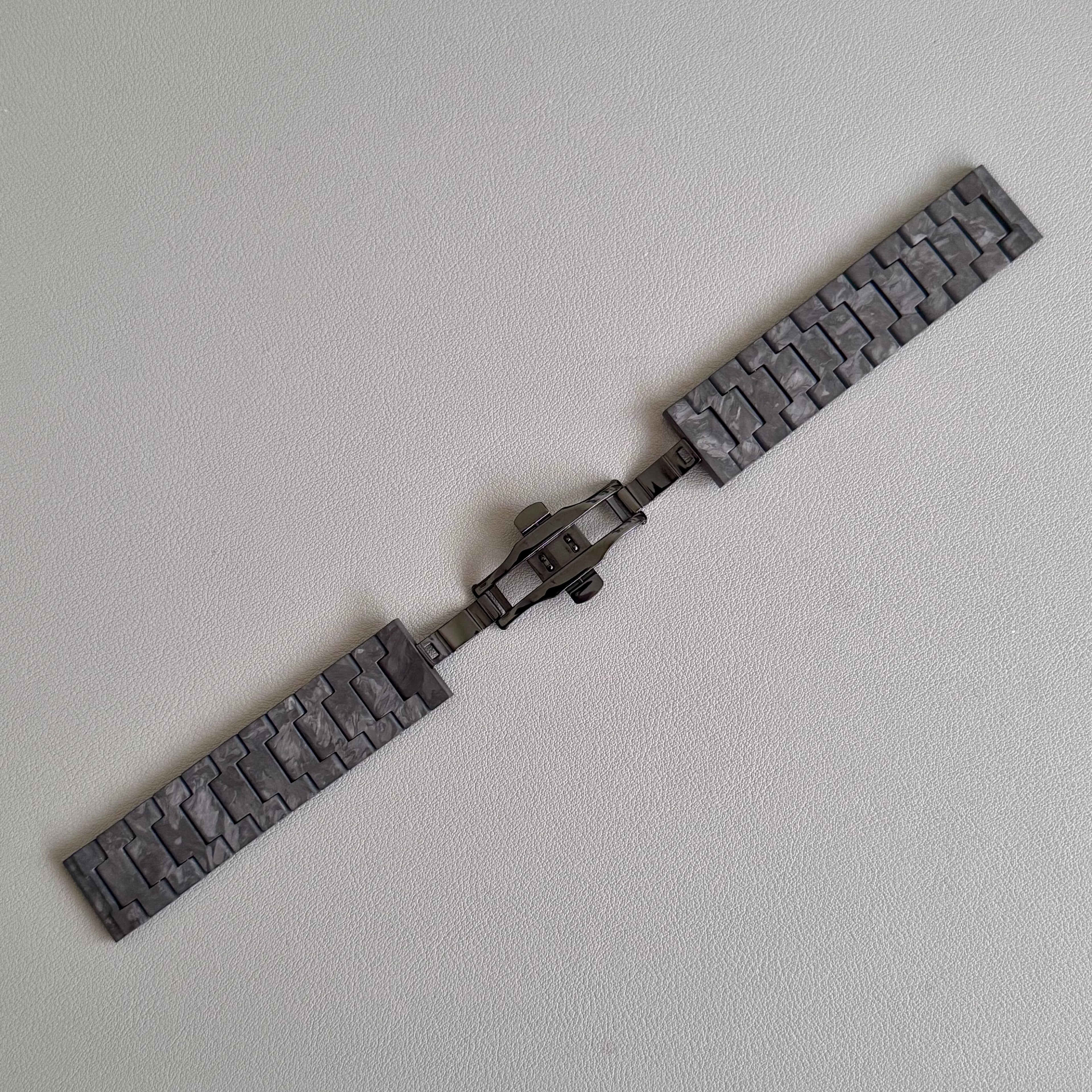 Close up of PVD black steel butterfly clasp