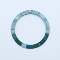 BZI008GRBL 38mm Green with Blue Text SUB Style Sloped Ceramic Insert