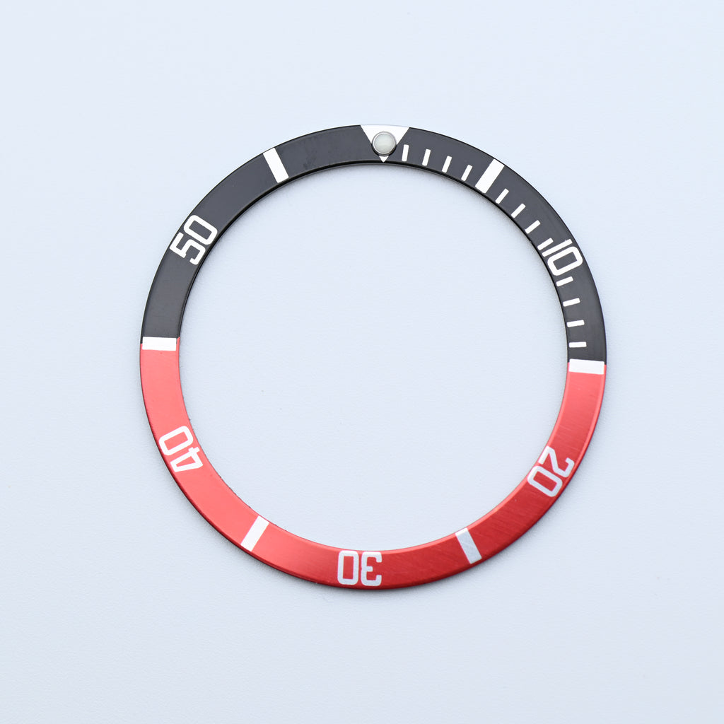 BZI018BKRD 38mm Black and Red with Lume Pip Flat Anodised Aluminium Insert