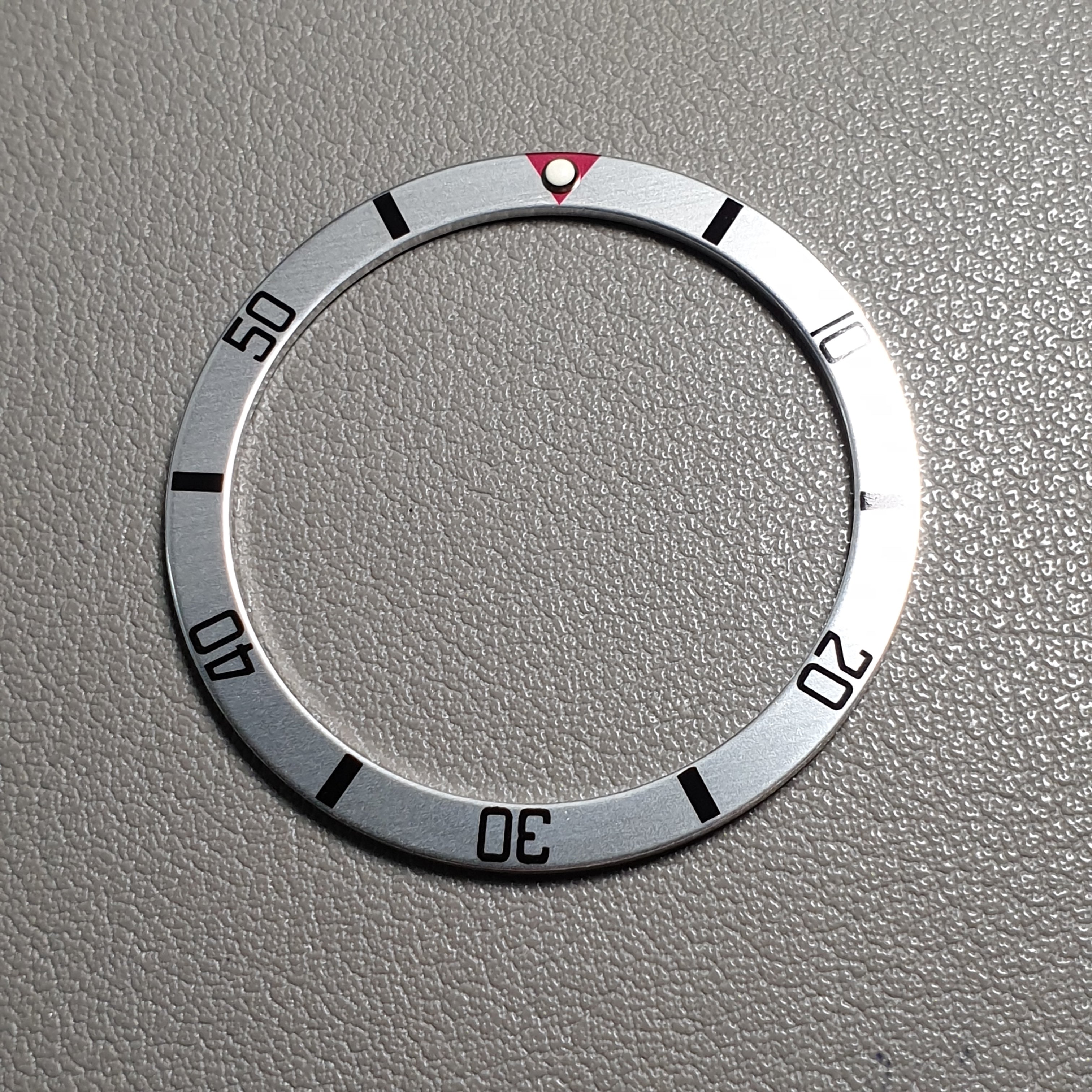 BZI018SI 38mm Red with Silver Text and Lume Pip Flat Anodised Aluminium Insert