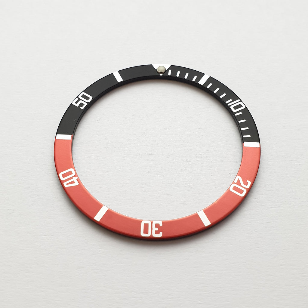 BZI018BKRD 38mm Black and Red with Lume Pip Flat Anodised Aluminium Insert