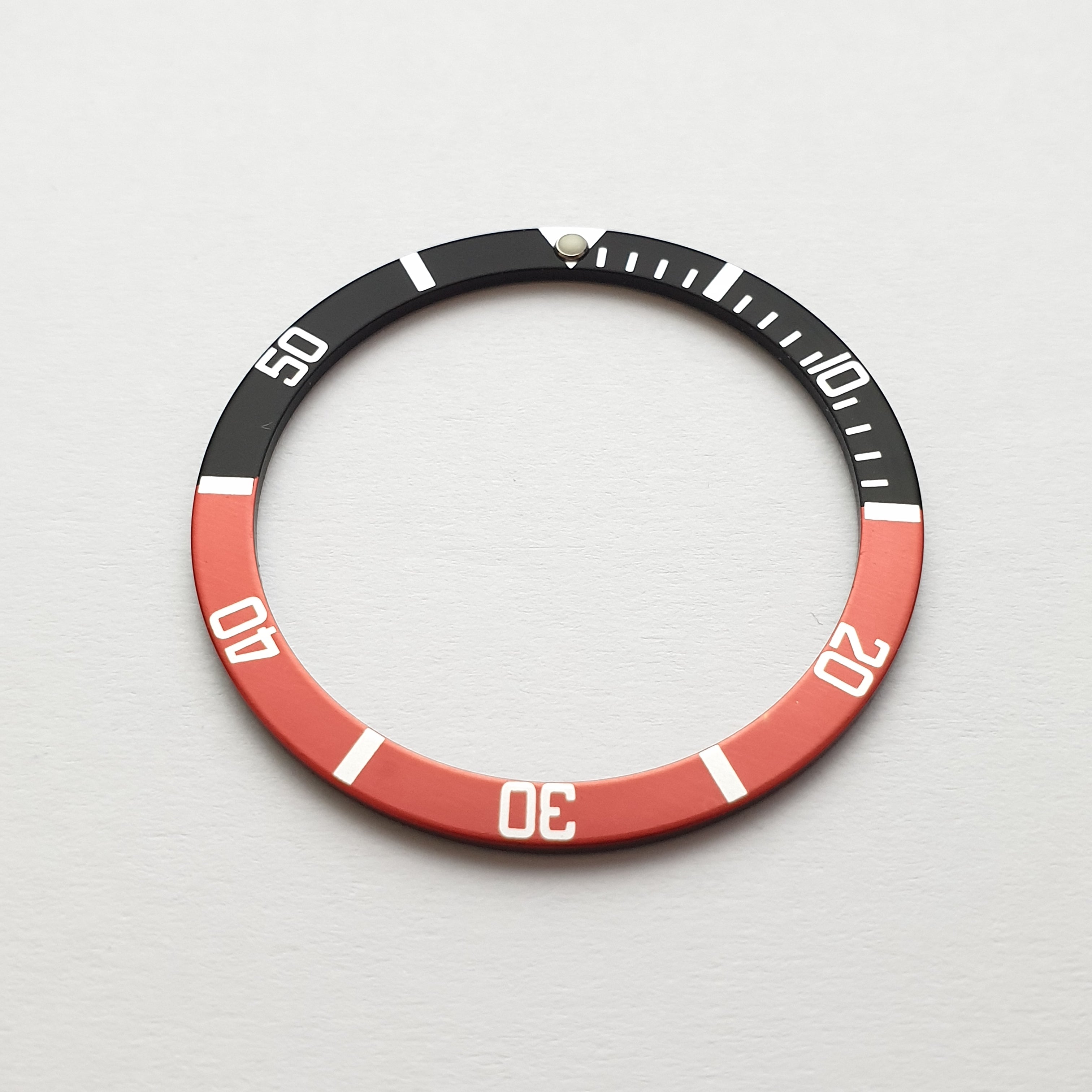 BZI018BKRD 38mm Black and Red with Lume Pip Flat Anodised Aluminium Insert